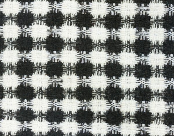 Quali sono i migliori consigli per indossare una giacca di tweed in un contesto professionale?